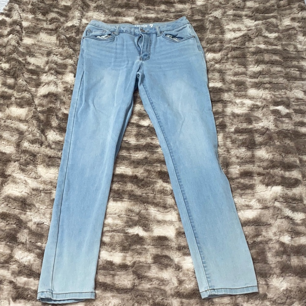 Light blue mid rise skinny jeans